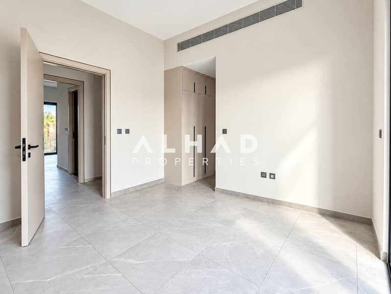 6 Sunlit Minimalist Room with Built-In Wardrobe. png