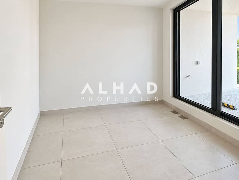 7 Sunlit Minimalist Room with Patio Window. png