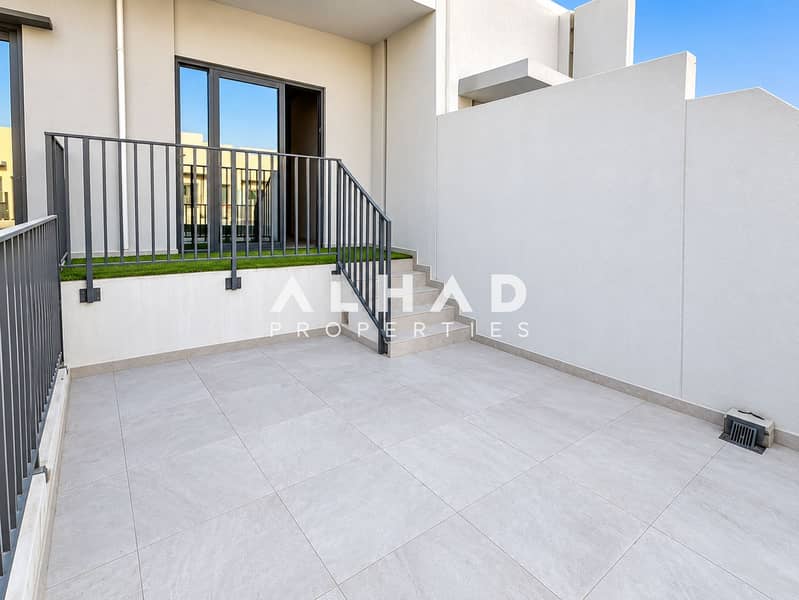 10 Modern Sunlit Townhouse Patio. png