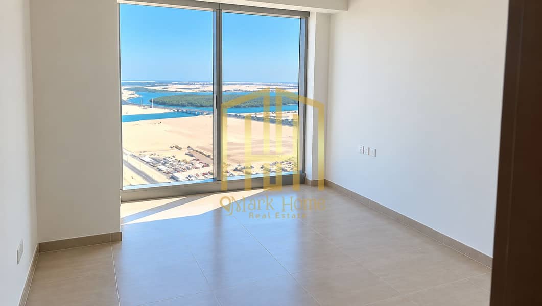 8 Minimalist Room with Coastal Waterfront View. png