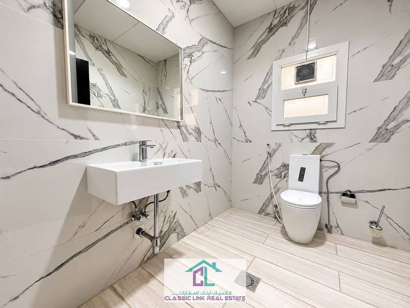 7 Polished Marble Minimalist Bathroom. png