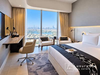 Hotel Apartment in vendita a Jumeirah Village Triangle (JVT), Dubai - Luxury Hotel Room with Skyline Views. png