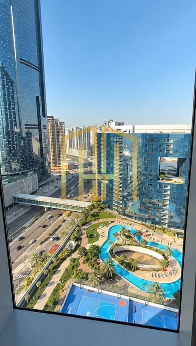 2 habitaciones Apartamento para en Venta en Al Reem Island, Abu Dhabi - Sunlit Skyline with Pool and Towers. png