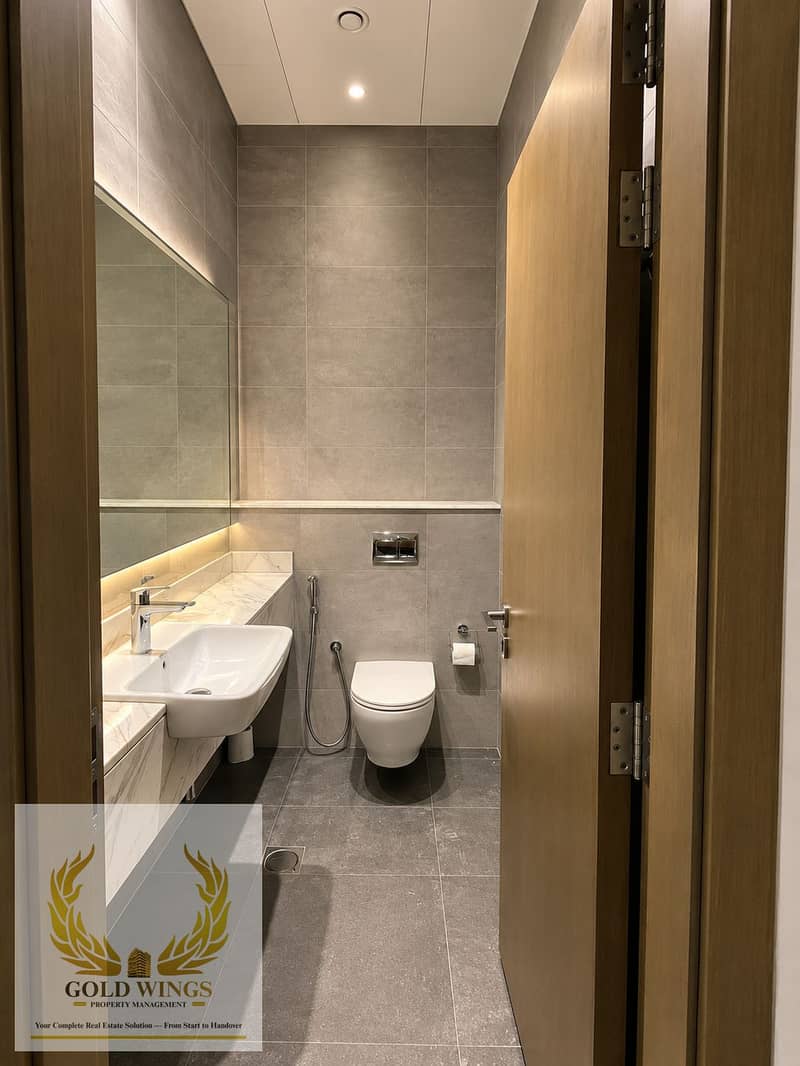 14 Modern Gray-Tiled Bathroom Interior. png