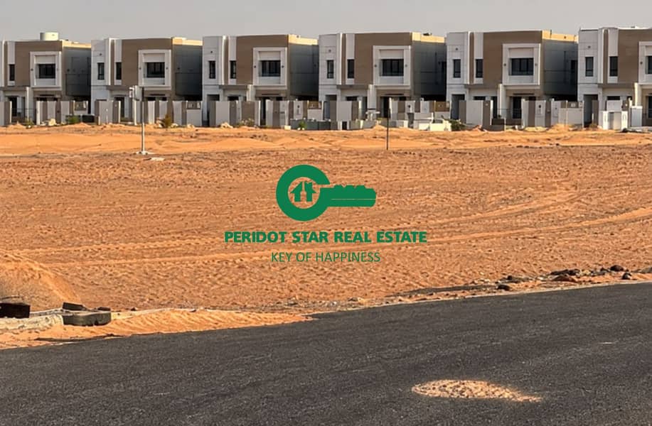 Modern Townhomes Across a Sandy Lot. png Modern Townhomes Across a Sandy Lot. png