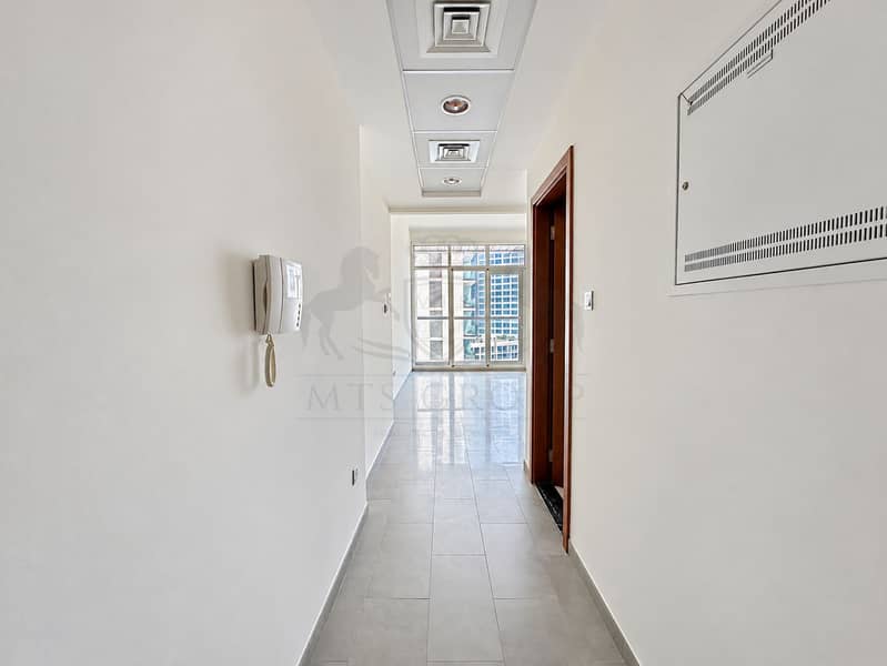 9 Modern Apartment Hallway with City Views. png