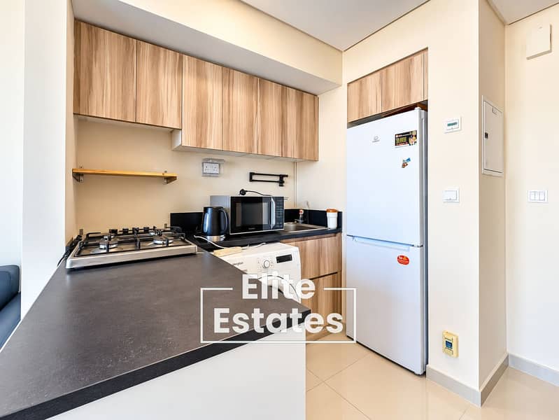 13 Modern Compact Kitchenette Interior. png