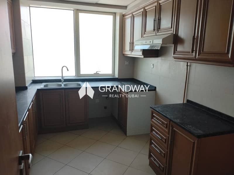 2 Elegant 2BR I High Floor Community View I Vacant — photo 1