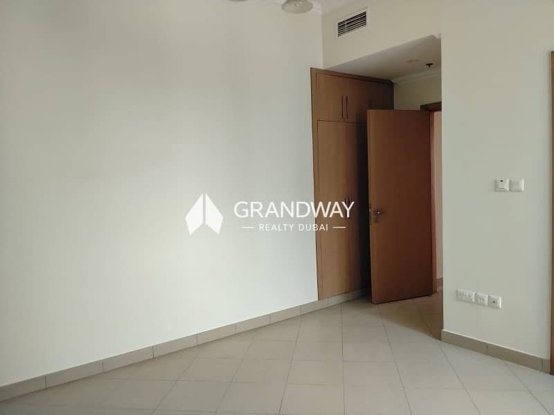 8 Elegant 2BR I High Floor Community View I Vacant — photo 8