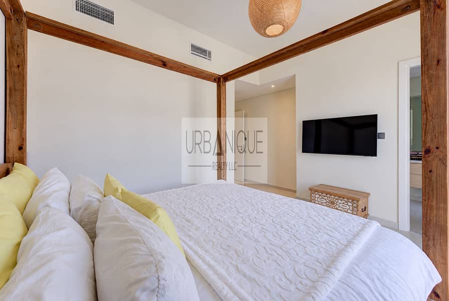 14 Minimalist Bedroom with Wooden Canopy Bed. png