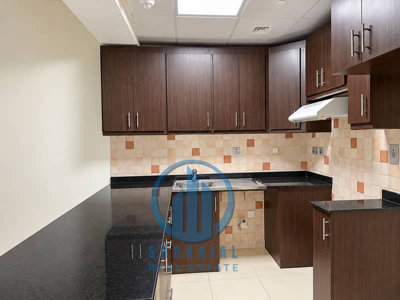 4 Modern Espresso U-Shaped Kitchen. png
