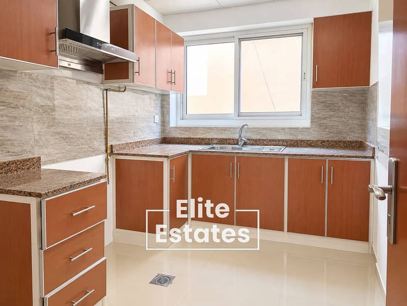 5 Bright Modern L-Shaped Kitchen. png