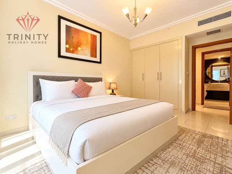 9 Warm Modern Bedroom with Bathroom View. png