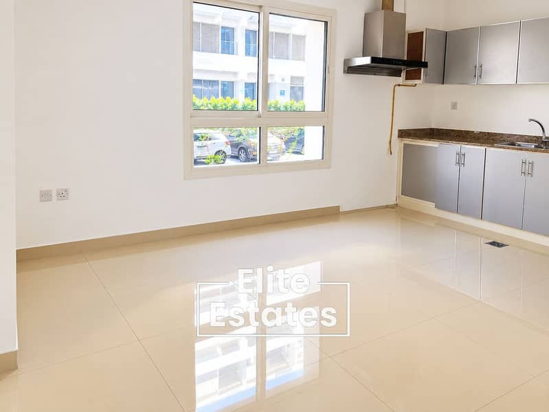 4 Bright Minimalist Open-Plan Kitchen Interior. png