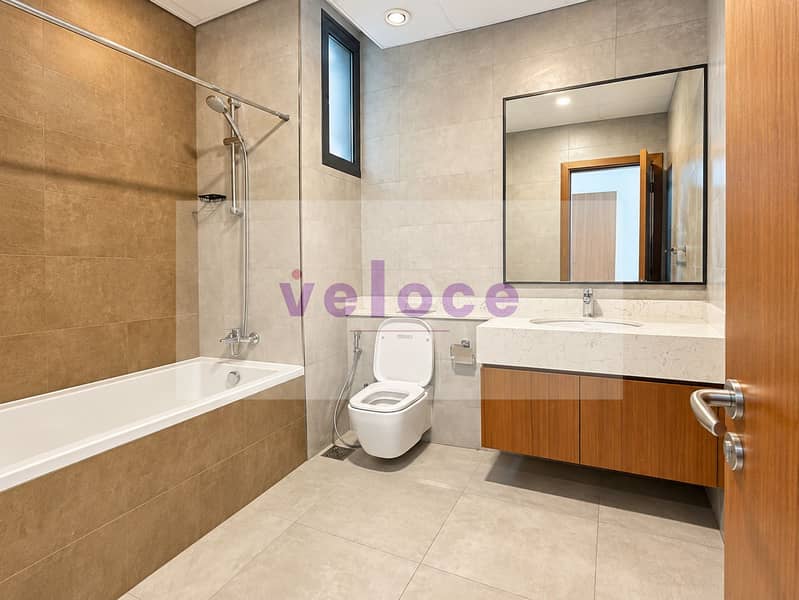 6 Modern Neutral Tile Bathroom. png