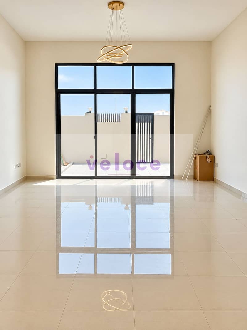 7 Minimalist Room with Reflective Floors. png
