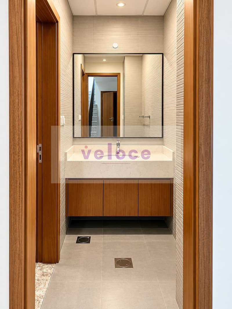 15 Modern Wood-Toned Vanity Alcove. png