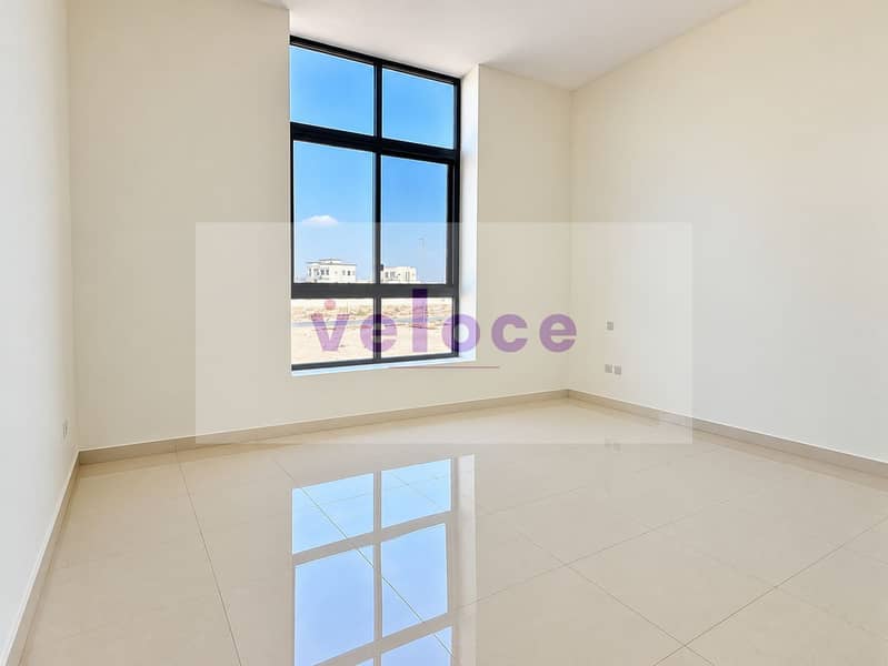 16 Sunlit Minimal Room with Window Reflections. png
