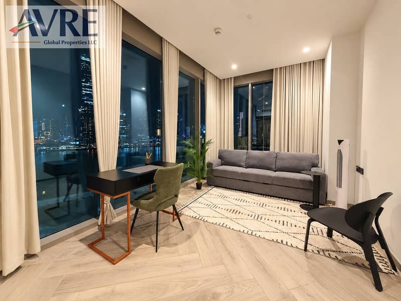 6 Modern Nighttime Cityview Living Space. png