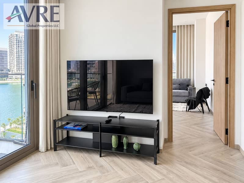 8 Modern Living Room with Waterfront View. png