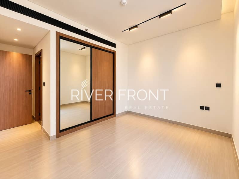 4 Modern Empty Bedroom with Mirrored Wardrobe. jpg