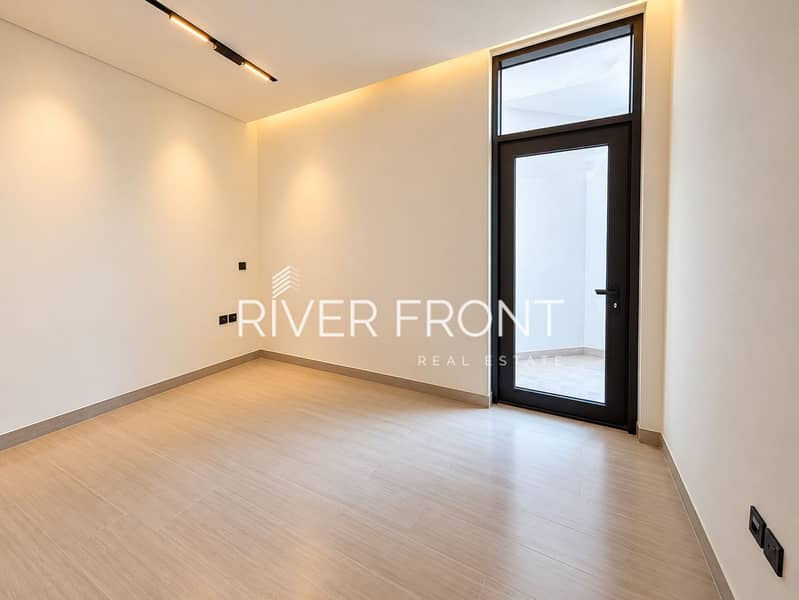 6 Minimalist Room with Warm Track Lighting. jpg