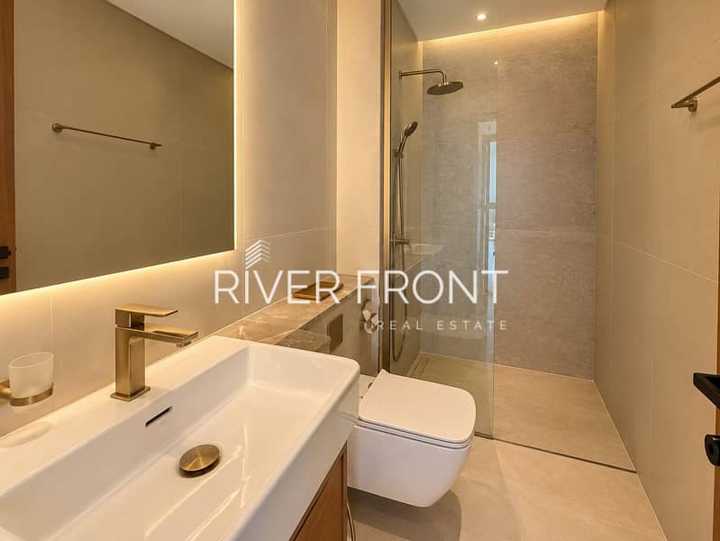 9 Warm Minimalist Bathroom Retreat. jpg