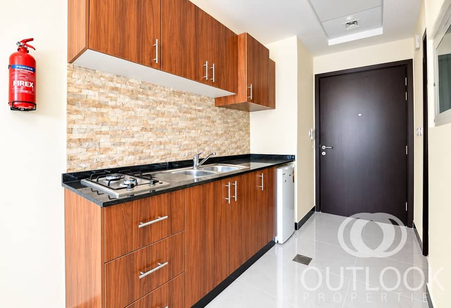 3 Modern Woodgrain Galley Kitchen. png