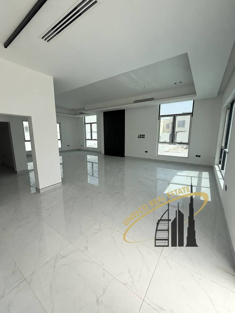 6 Sunlit Marble Hall with Black Entry Door-9. png