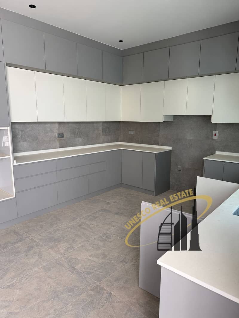 11 Kitchen corner with open gray cabinets-17. png