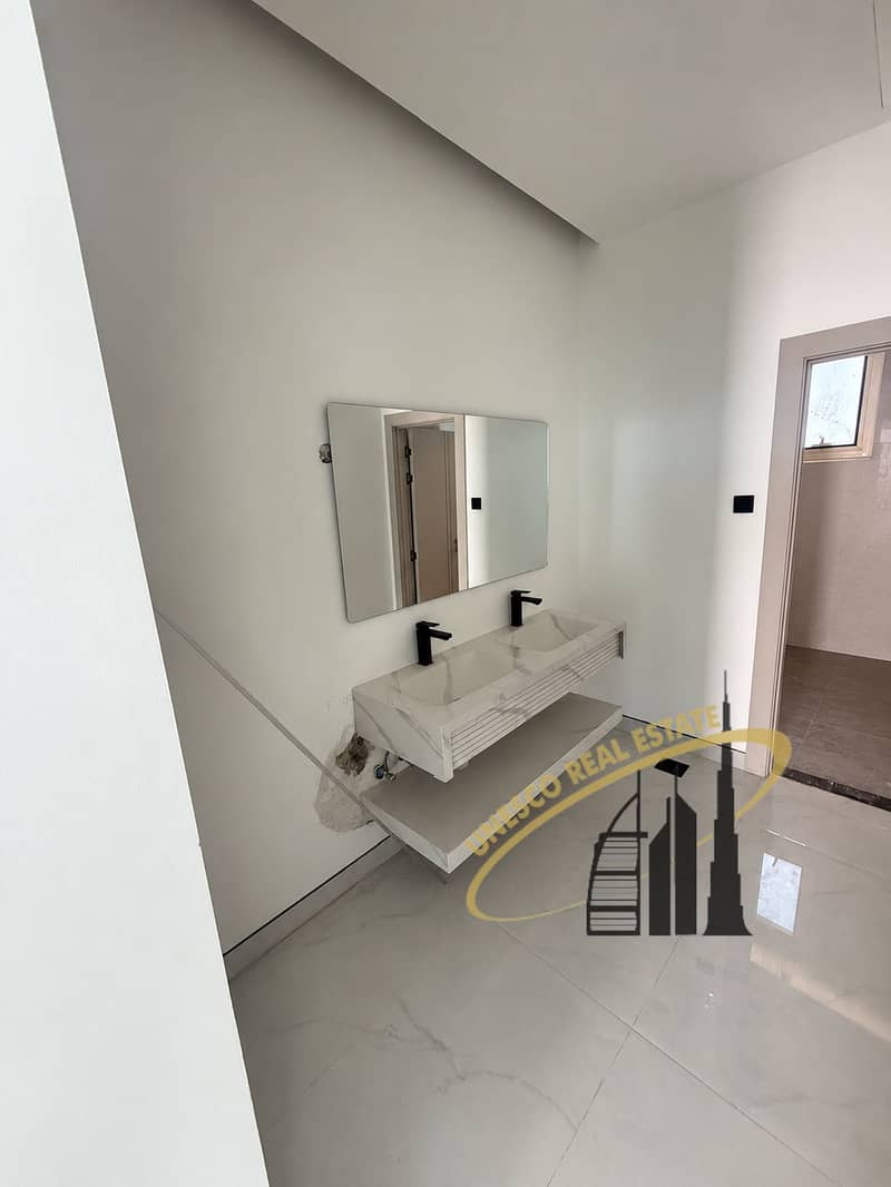 13 Double marble vanity in unfinished bathroom-3. png
