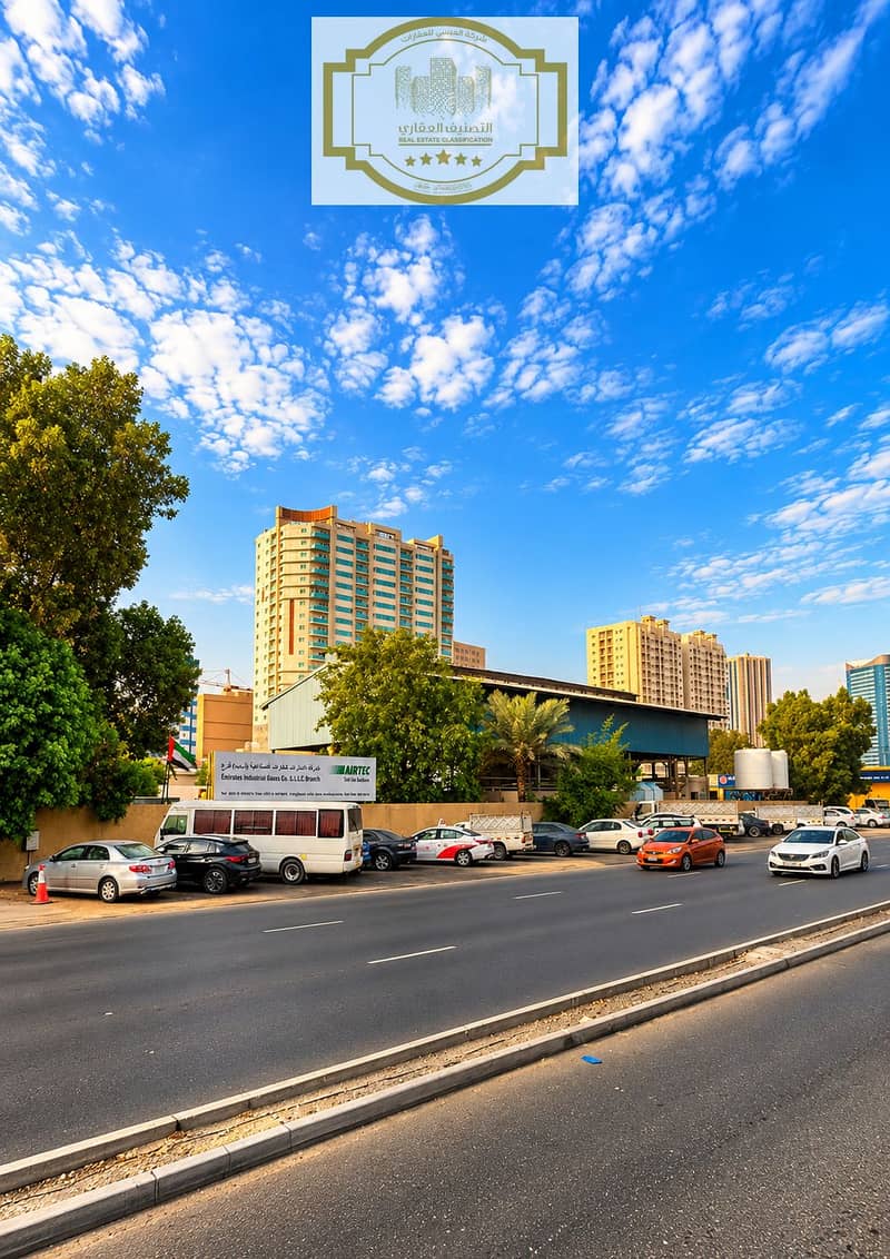 2 Dubai Street with AIRTEC Sign and Skyline. png