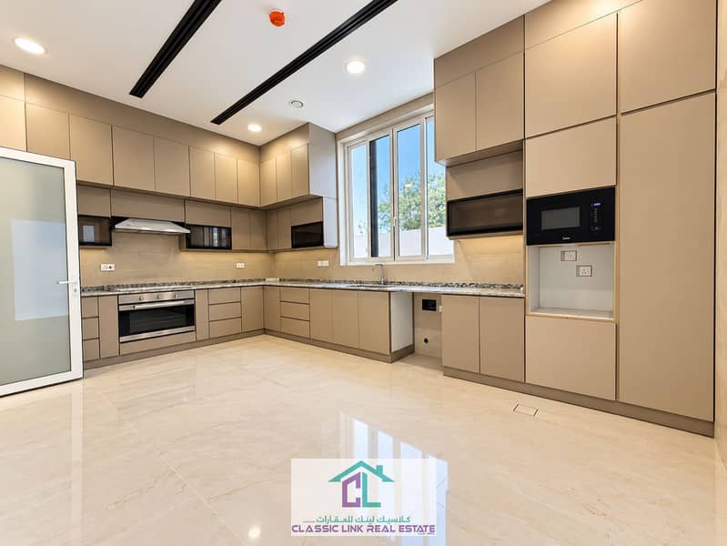 2 Modern Beige L-Shaped Kitchen. png