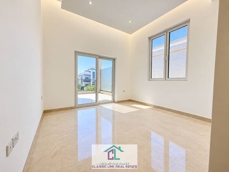 13 Sunlit Minimalist Room with Glass Doors. png