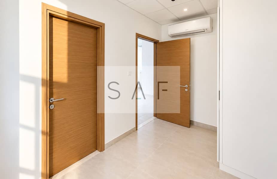6 Bright Minimalist Hallway with Oak Doors. png