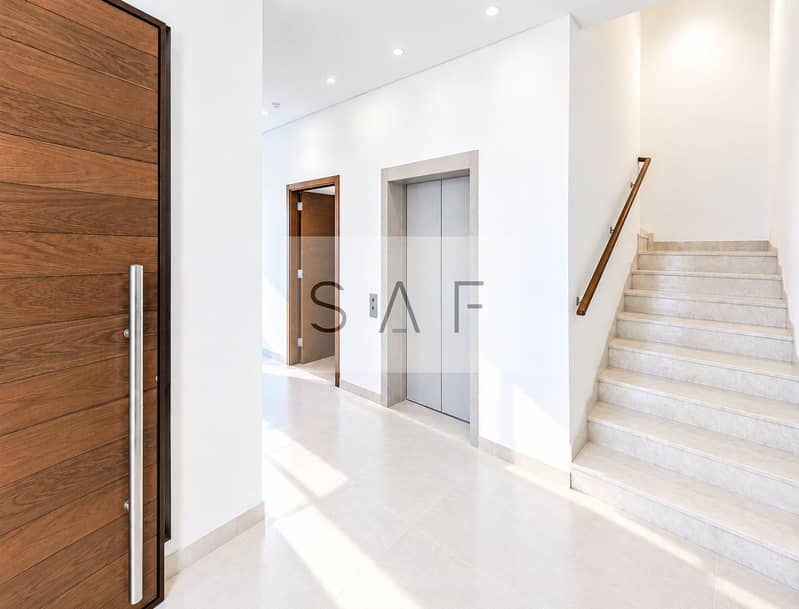 12 Modern Minimalist Foyer with Elevator and Staircase-2. png
