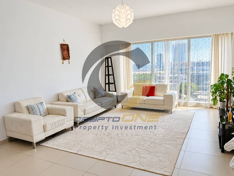 3 18_sunlit_neutral_living_room_with_city_views. png