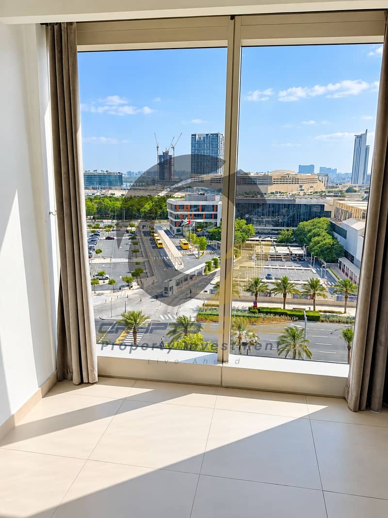 9 05_sunlit_apartment_overlooking_urban_campus. png