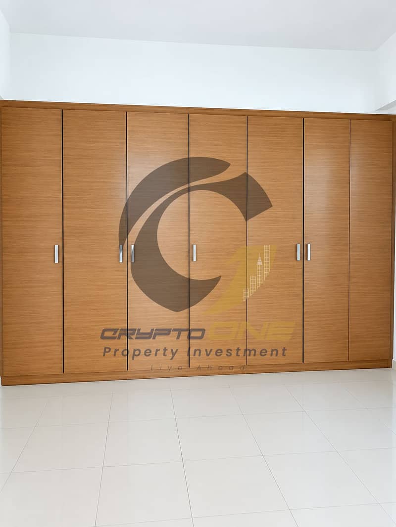 12 03_minimalist_warm_wood_built_in_wardrobe. png