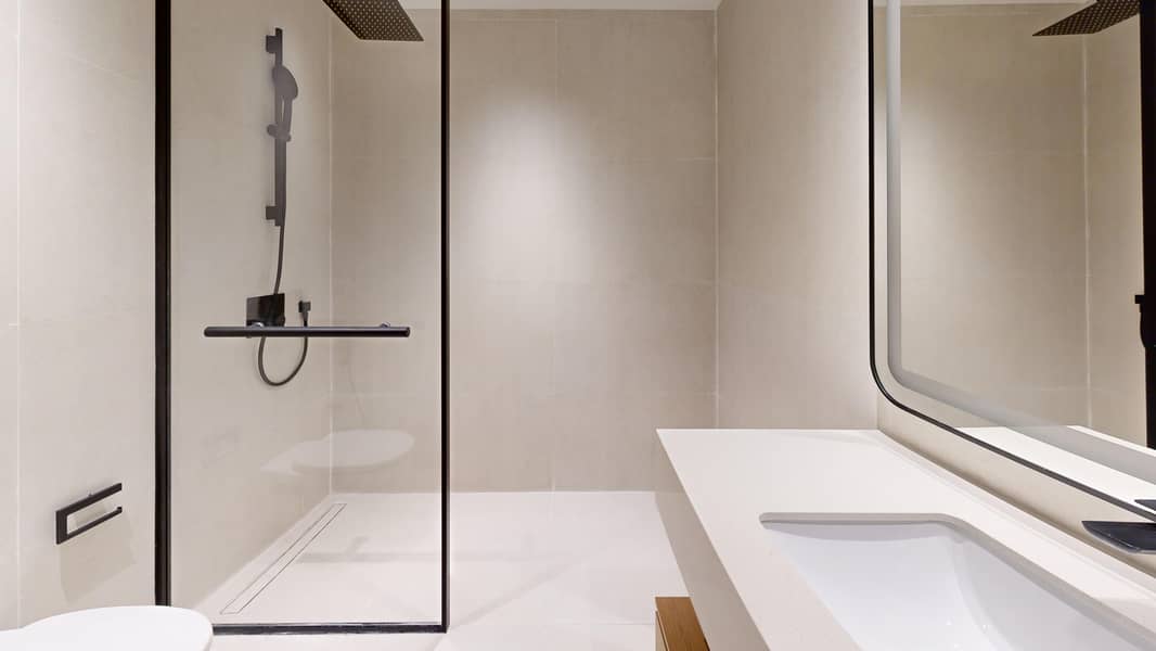 2 Layout-06RB-J-1BHK-Bathroom. jpg