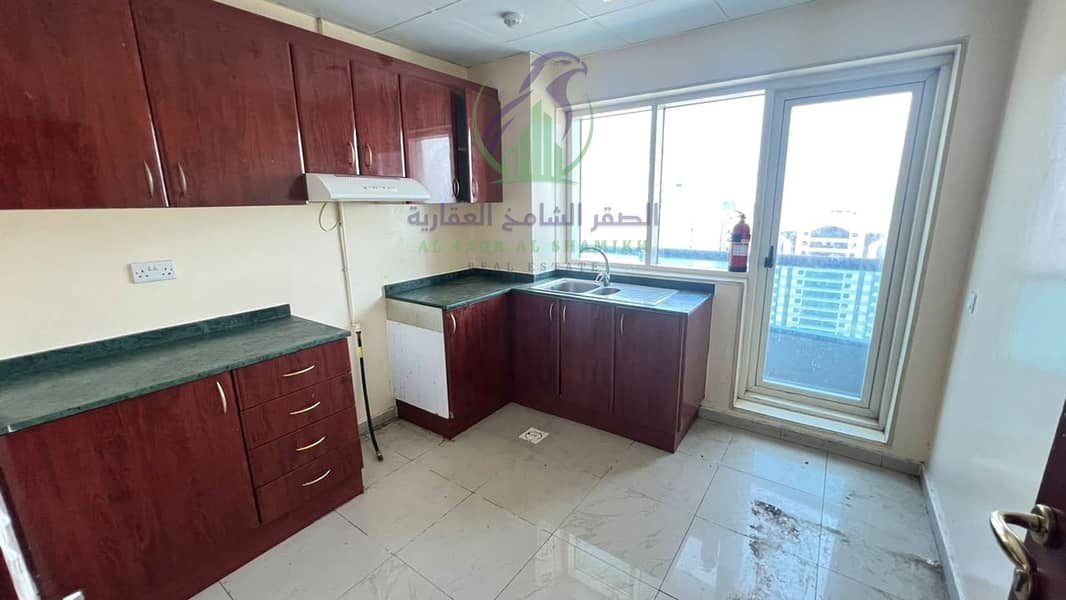 11 apartment-for-rent-2-bedroom-altaawn-alsharqh-kitchen-06. jpg