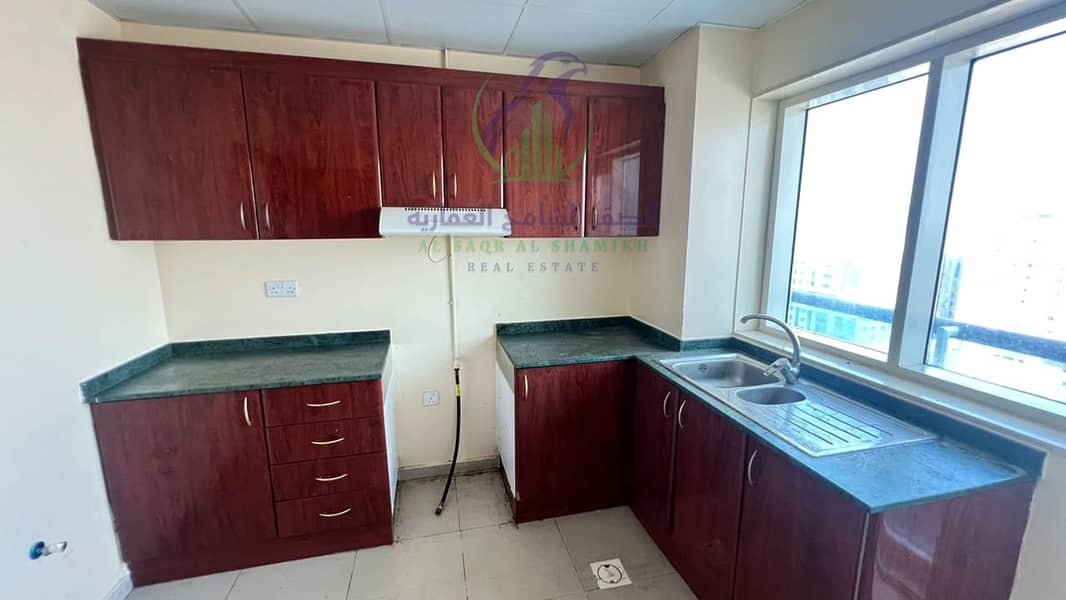 13 apartment-for-rent-2-bedroom-altaawn-alsharqh-kitchen-10. jpg