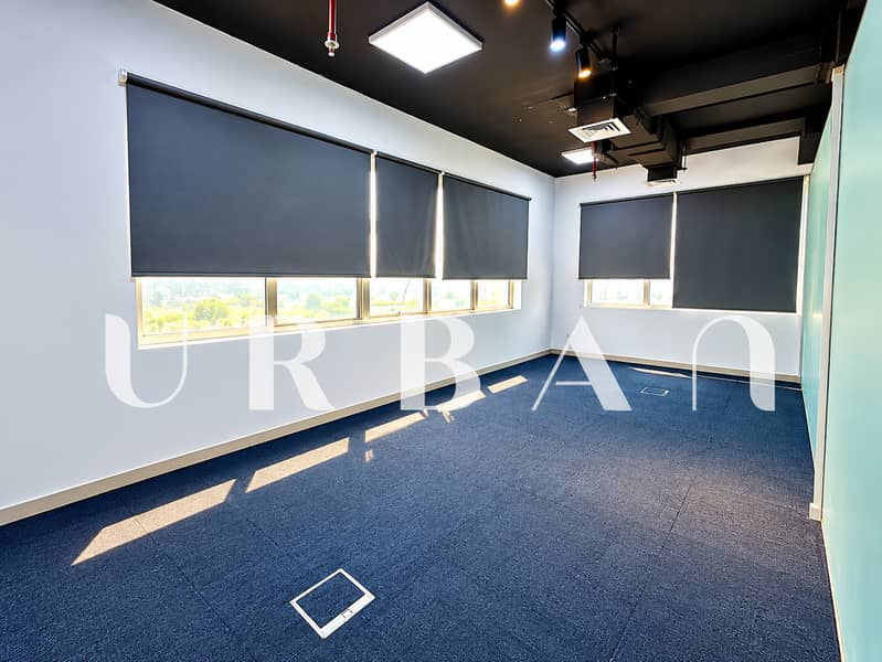 5 Modern Office with Blue Carpet and Blinds. png