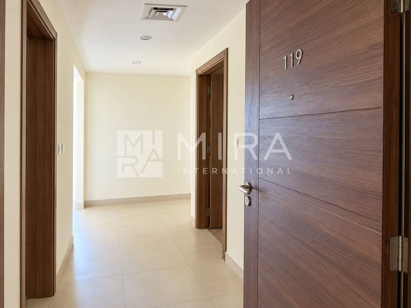 8 Welcoming Entryway with Open Wood Door-2