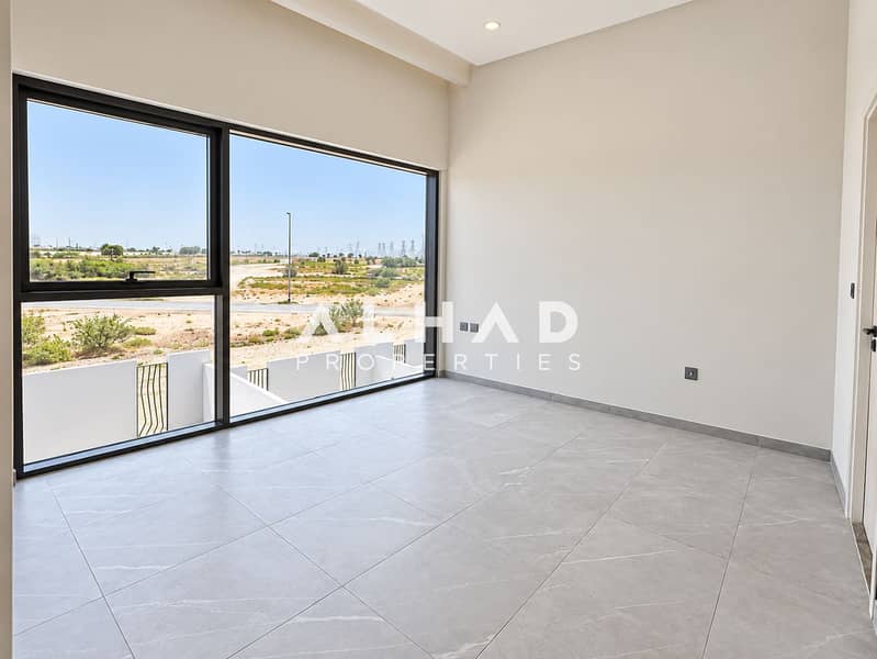 2 Bright Minimalist Room with Expansive Window. png