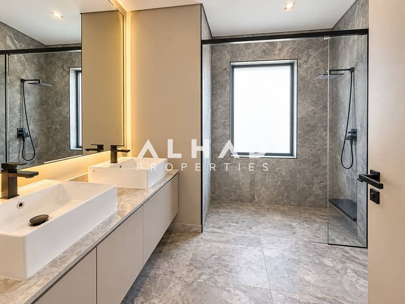 8 Modern Greige Bathroom with Glass Shower. png