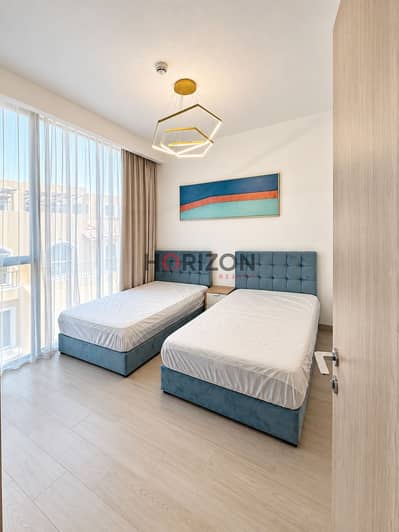1 Bedroom Flat for Rent in Jumeirah Village Circle (JVC), Dubai - Modern Twin Bedroom with Teal Beds. jpg
