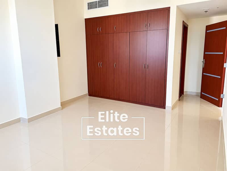 6 Minimalist Room with Glossy Floors and Wardrobe. png