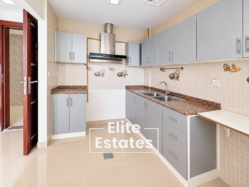 9 Modern Grey Kitchen with Mosaic Backsplash. png