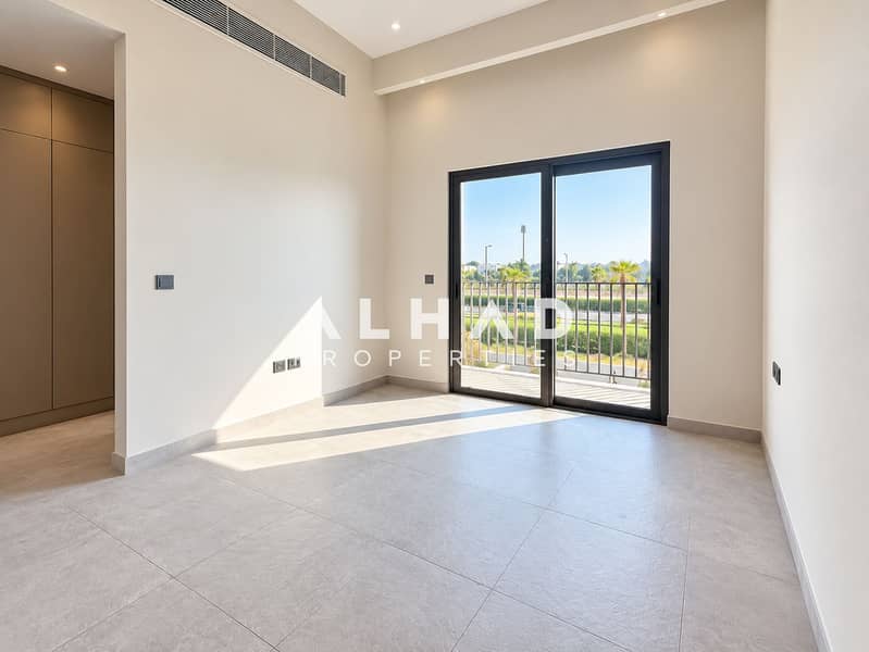 4 Bright Minimalist Room with Balcony View. png